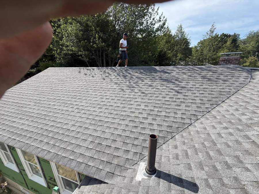 Wide view of a newly installed architectural asphalt shingle roof on a South Shore home